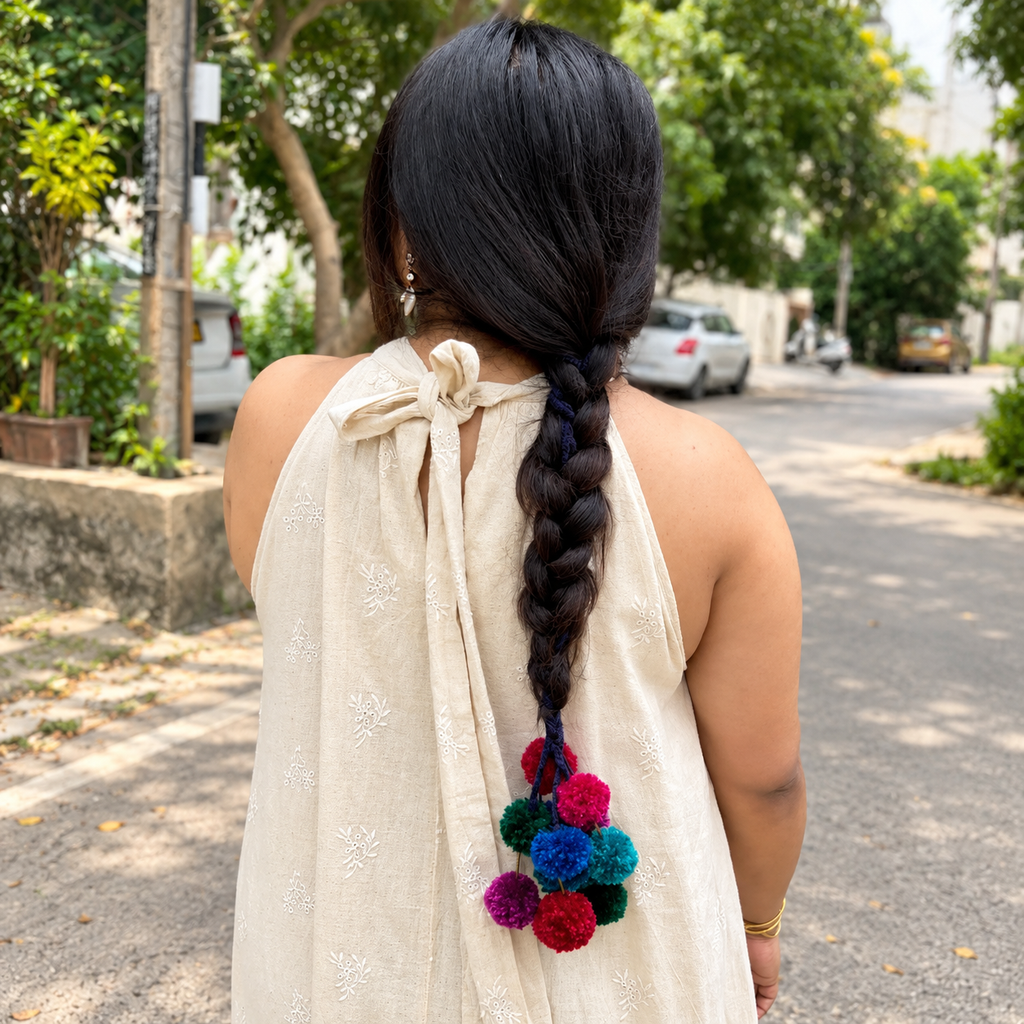 Madras Check Kerala Parandi hair accessory in traditional checkered pattern for festive styling

