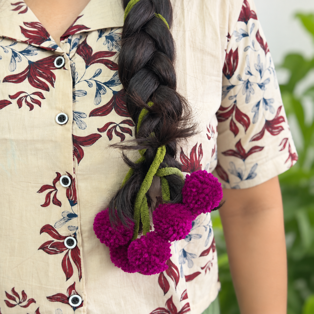 Vadamalli flower Kerala Parandi hair accessory in pink and purple for South Indian bridal styling
