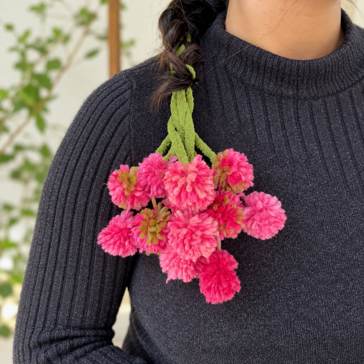 Bougainvillea Parandi hair accessory with pink and magenta floral tassels

