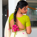 Close-up of Bougainvillea Parandi traditional Indian braid accessory
